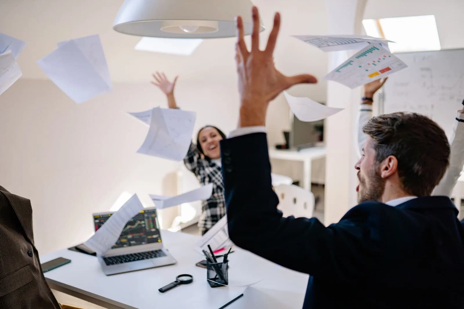 Business team celebrating results — B2B SaaS & Technology marketing by TML Agency