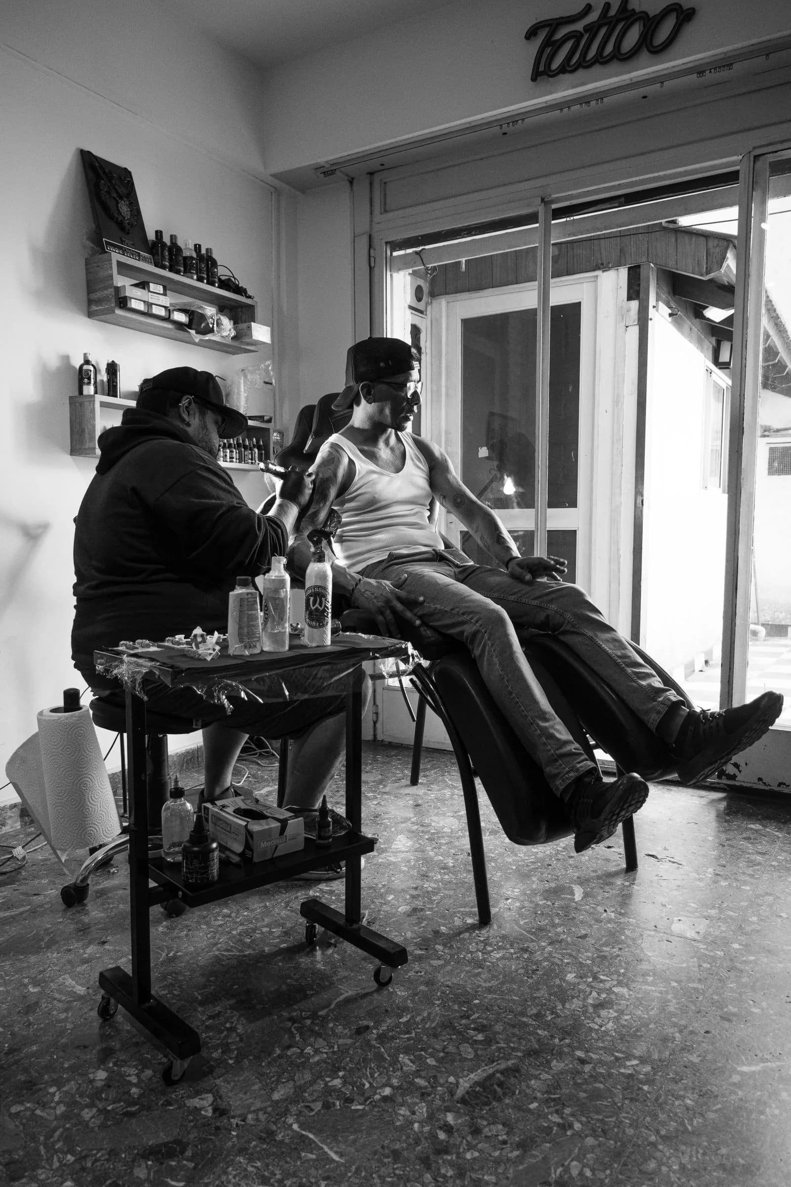 Tattoo artist client consultation — Tattoo Shops & Tattoo Artists marketing by TML Agency
