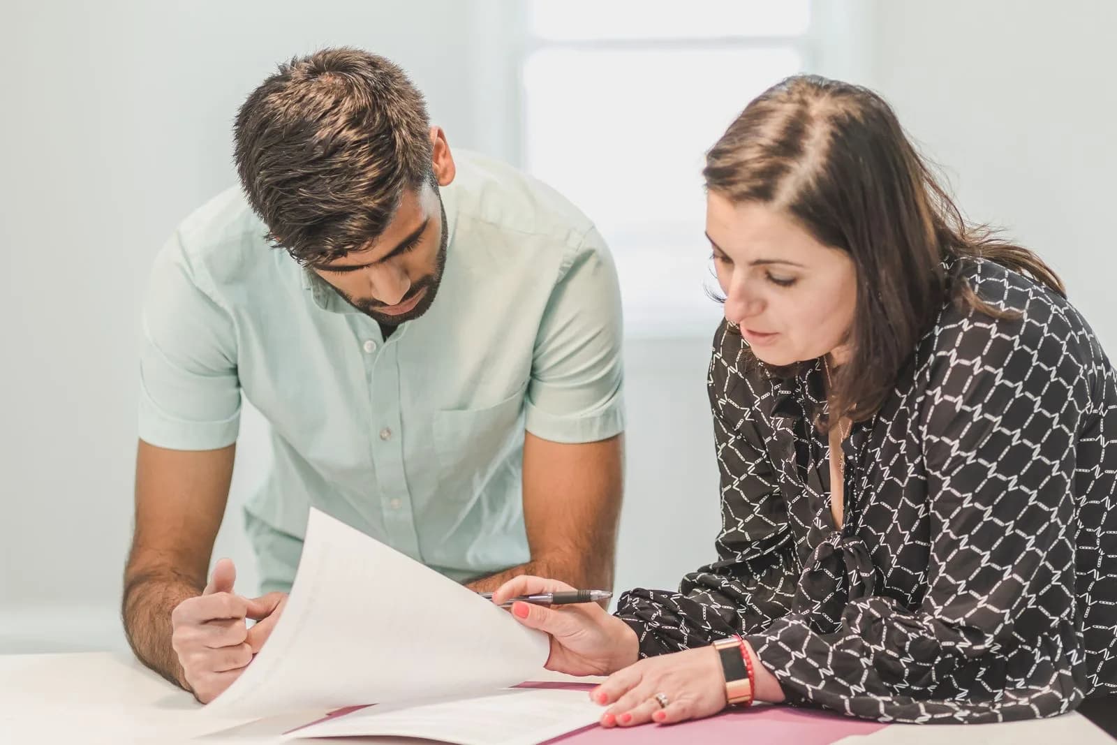 Contractor consulting homeowner — Construction & Home Services marketing by TML Agency