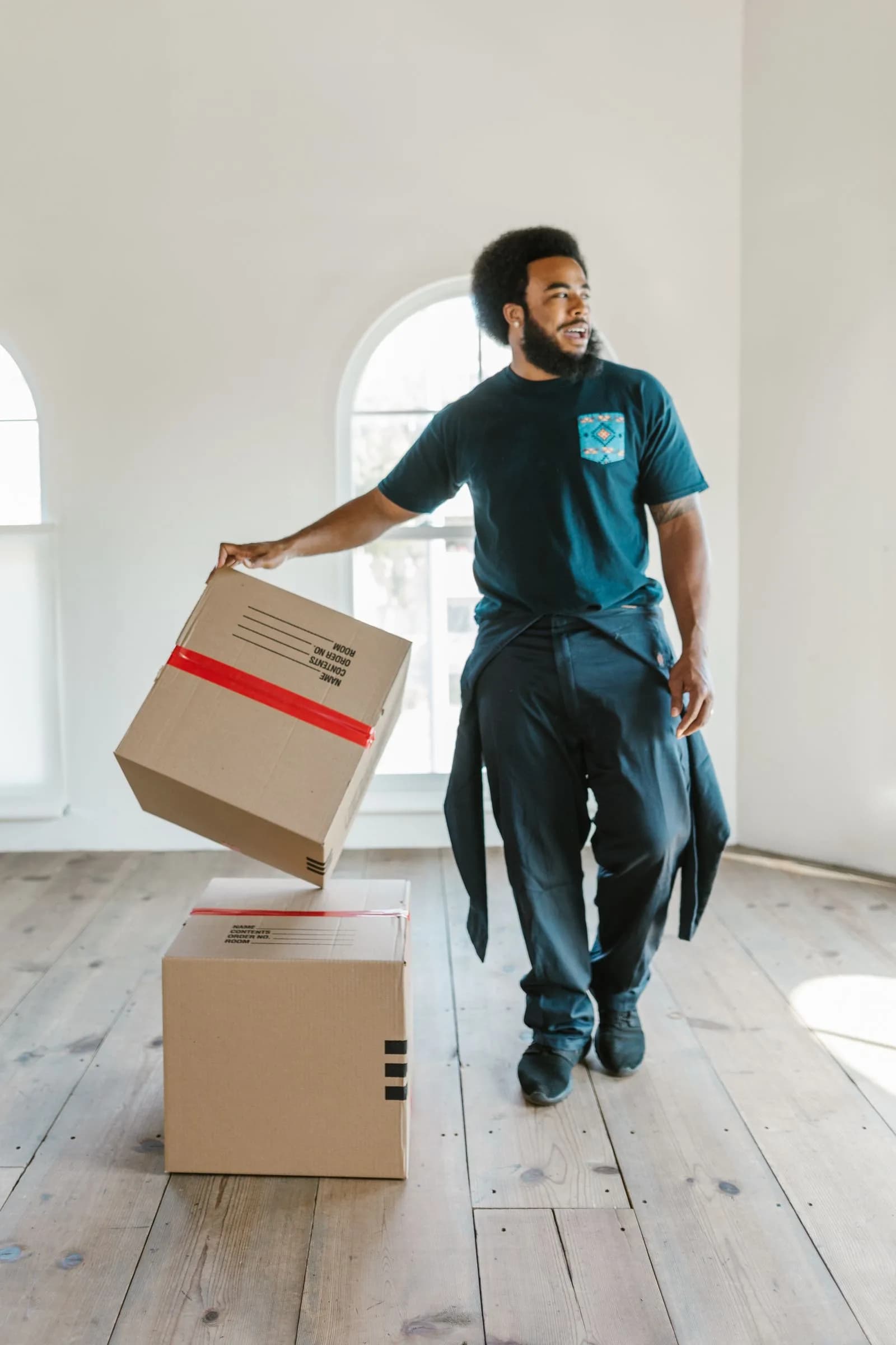 Movers unpacking boxes — Moving Companies & Relocation Services marketing by TML Agency