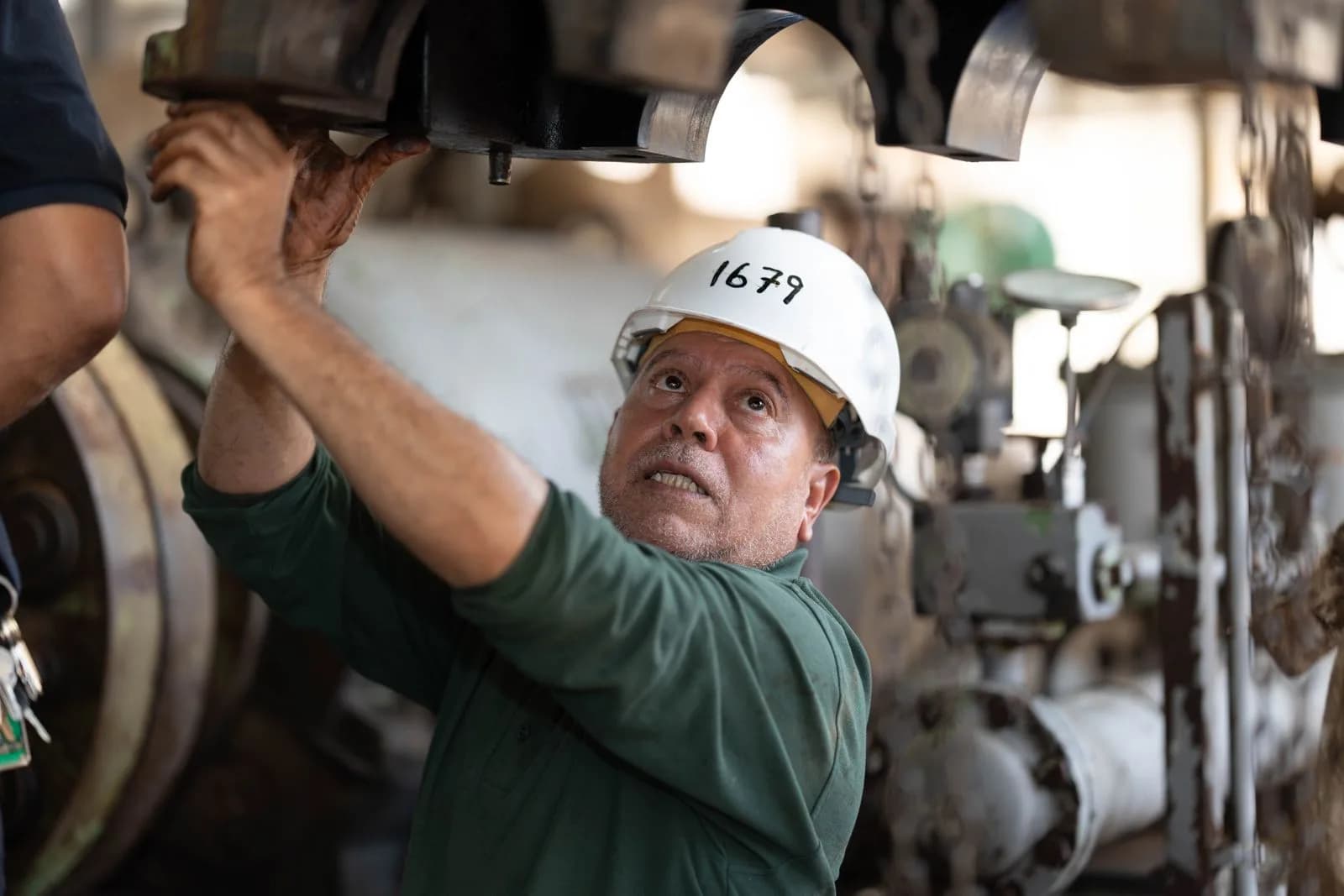 Engineer inspecting equipment — Manufacturing & Industrial marketing by TML Agency